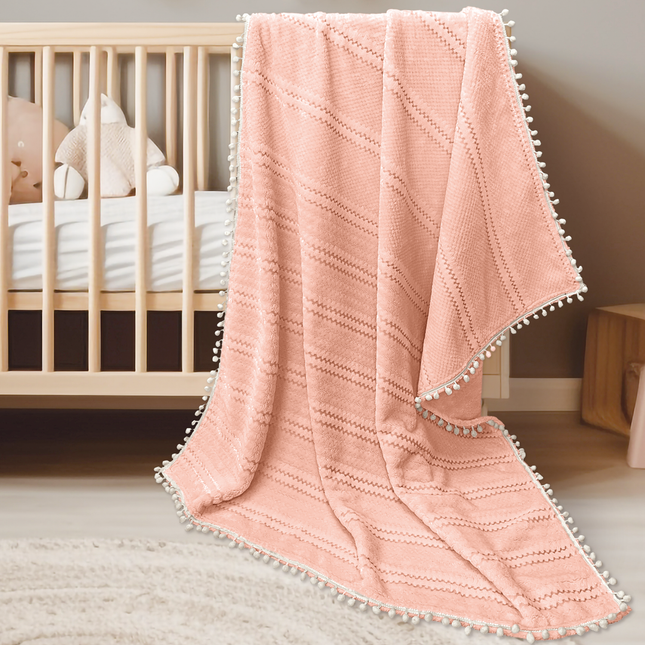 Imagen del producto Cobertor Baby Pom-Pom Salmón de Regina, con diseño premium y detalles descriptivos